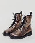 Bronze metallic leather lace-up ankle boots with black soles and pull tabs.