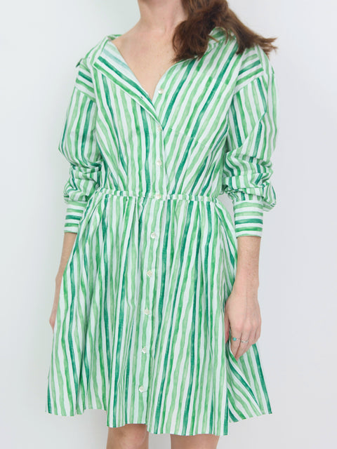 Green and white vertical striped mini dress with off-shoulder neckline and long sleeves.