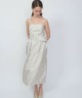 Sleeveless midi dress with square neckline in white fabric featuring small orange floral print.