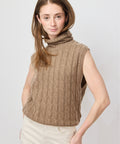 Sleeveless pecan brown cable knit turtleneck sweater with relaxed fit.