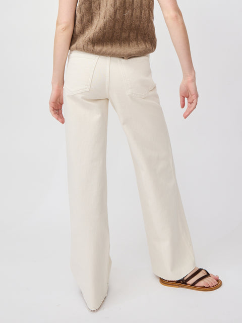 High-rise wide-leg bone denim pants with clean back pockets and a slightly relaxed fit.