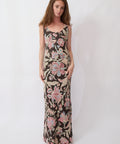 Woman wearing a floral dress on a white background