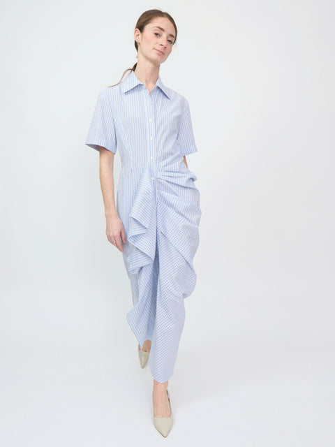 Light blue and white striped shirt dress with short sleeves and gathered ruffle detailing down the front.