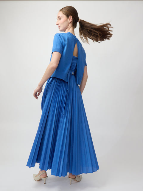 Blue pleated midi dress with short sleeves and keyhole back detail.