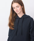 British navy dress with long sleeves, hoodie, and relaxed fit in soft fabric.