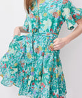 Light turquoise floral dress with puff sleeves, button-front, and gathered waist.