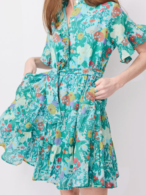 Light turquoise floral dress with puff sleeves, button-front, and gathered waist.