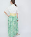 Green and white striped maxi dress with yellow waistband and short sleeves, back view.