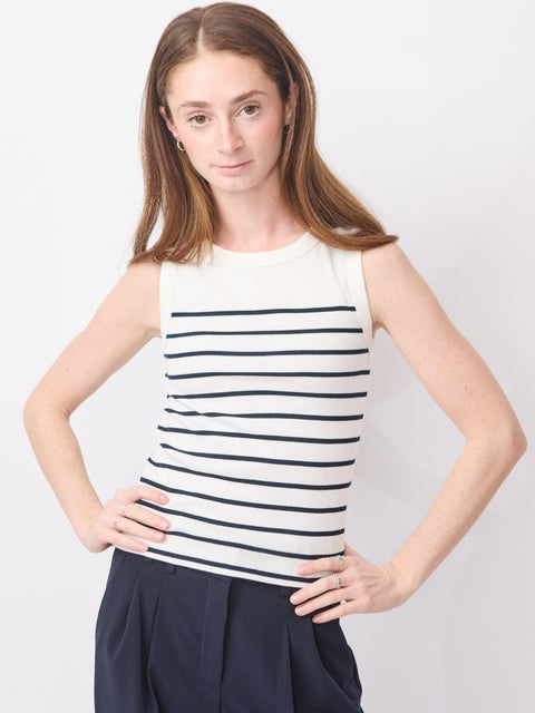Sleeveless ecru top with horizontal navy stripes and round neckline.