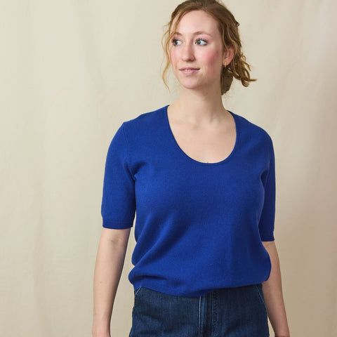 Beautiful woman wears a blue scoop neck cotton/cashmere tee